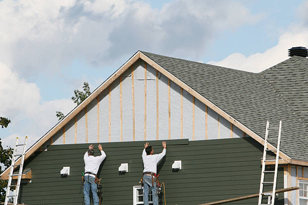 Professional Siding technician working in Chester, NY